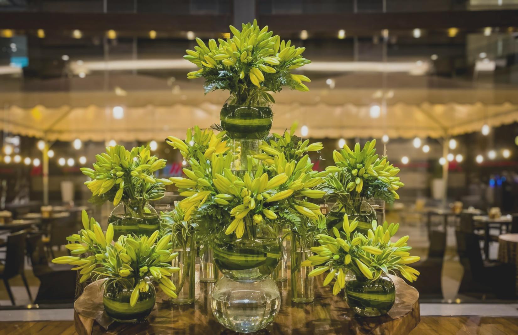 Fresh floral arrangements showcasing our design philosophy
